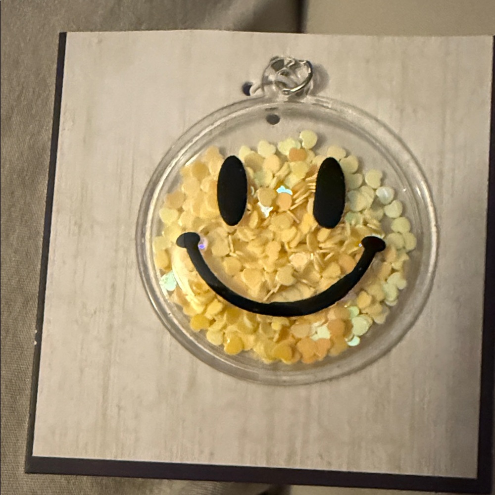 NWT Smiley Face Pendant with Yellow Confetti 2.25” women’s